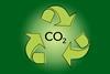 An image showing the recycling icon, with CO2 written in the middle